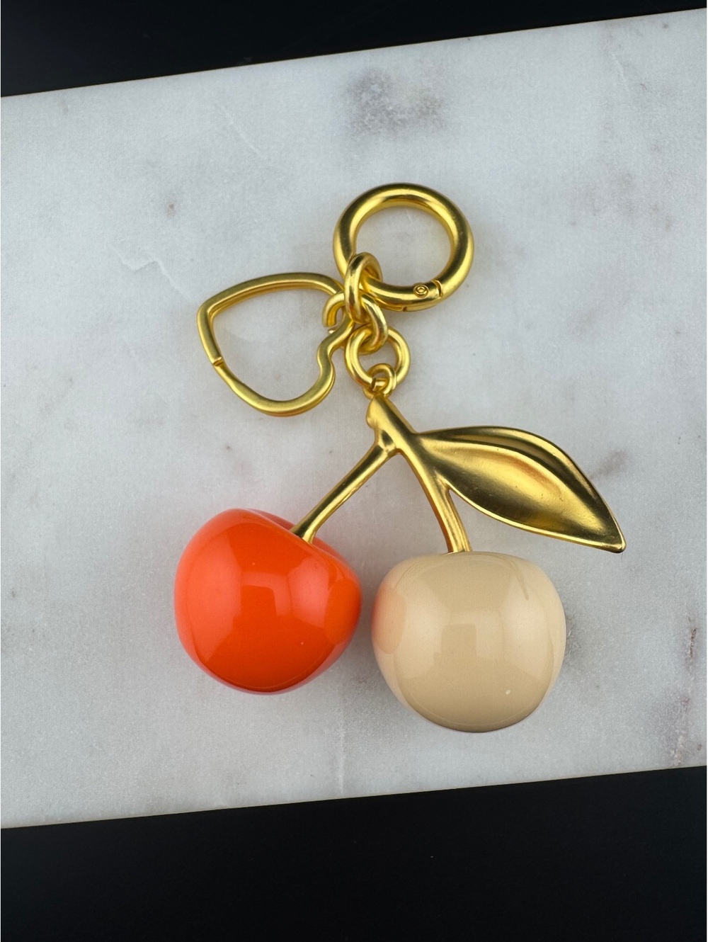Cherry Shaped Keychain with Gold Tone Leaf Accent